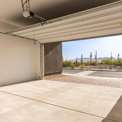 Finished garage interior with clean lines and open space, offering room for parking, storage, or hobbies.