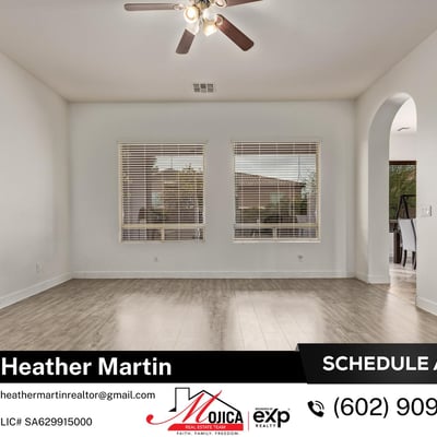 Dual windows fill this family room with natural light while maintaining privacy. The open layout enhances flow throughout this Glendale home for sale with private backyard pool.