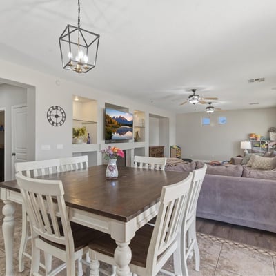 Dining space positioned between the kitchen and great room, allowing seamless flow for meals, gatherings, and entertaining.