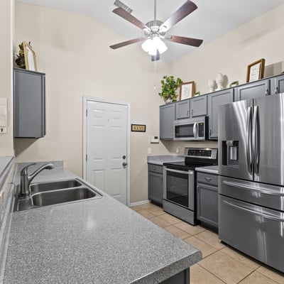 Well-designed kitchen with ample cabinetry, clean finishes, and natural light. Perfect for daily use and entertaining.