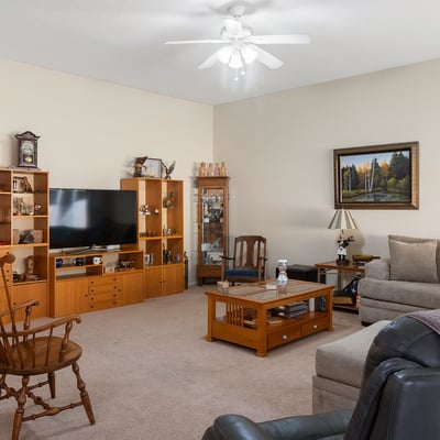 Spacious Phoenix living room with neutral finishes, ample seating, and inviting atmosphere designed for everyday comfort and gatherings.