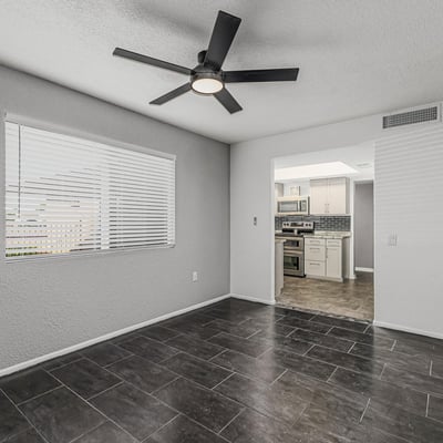 Bright and open room with updated flooring and natural light. This Sun City home offers versatile space to fit your lifestyle needs.