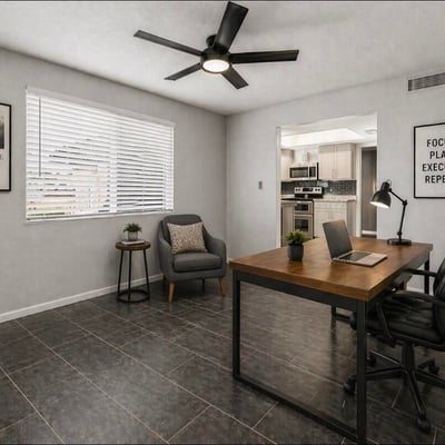 Staged workspace highlighting flexibility and modern design. This Sun City home offers updated interiors ideal for remote work or creative space.