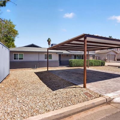 Covered parking combined with storage solutions, adding functionality and value to this remodeled Phoenix investment property.