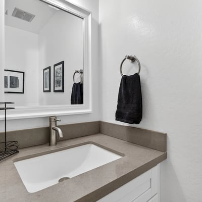 Contemporary Scottsdale bathroom vanity featuring sleek countertops, updated fixtures, and clean cabinetry for a polished, modern feel.