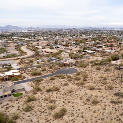 Unforgettable panoramic views overlook the Phoenix valley from this rare hillside lot near South Mountain Preserve. Experience vibrant sunsets, sparkling city lights, and endless desert beauty from every angle.