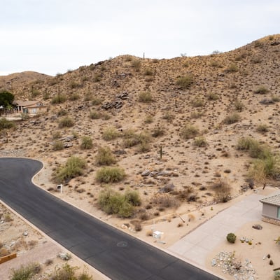 Peaceful cul-de-sac setting surrounded by rugged desert mountains and upscale custom homes. This premium Phoenix homesite offers elevated terrain, scenic views, and a tranquil desert lifestyle.