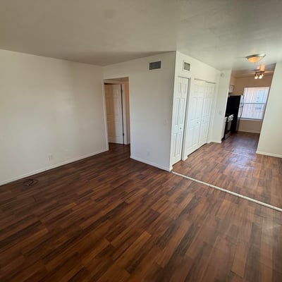 Versatile living space featuring durable flooring, abundant wall space, and an open floor plan. Natural light and flexible room arrangements enhance the home's comfortable and inviting atmosphere.