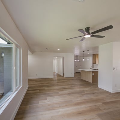The open floor plan connects the living room and kitchen, offering an ideal layout for entertaining while showcasing modern updates throughout the home.