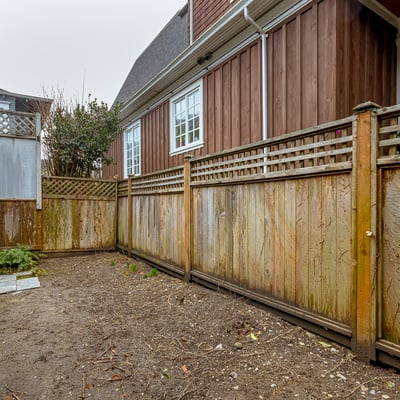 This spacious outdoor area features a private setting, perfect for gardening or outdoor activities.