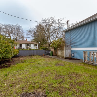 Spacious backyard offers ample potential for landscaping, gardening, or creating your own outdoor retreat.
