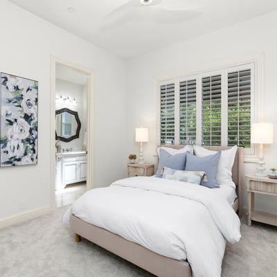 Downstairs Bedroom 1
Bright and inviting bedroom featuring soft decor, modern finishes, and natural light filtering through plantation shutters.