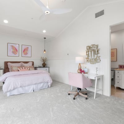 Bedroom 4-Spacious bedroom with soft carpeting, modern fixtures, and a dedicated workspace offering delightful natural light.