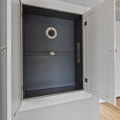 This unique built-in storage space offers convenient organization for your home essentials.
