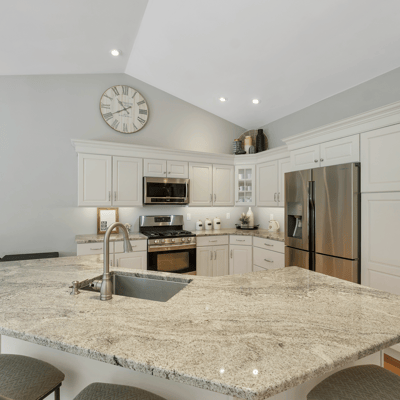 Bright and functional kitchen featuring modern appliances, a spacious island, and ample cabinetry for storage.