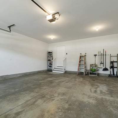 Spacious garage offering ample storage solutions and convenient access to the home’s interior.