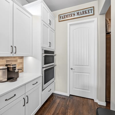 Coffee Bar in Kitchen that leads to pantry.