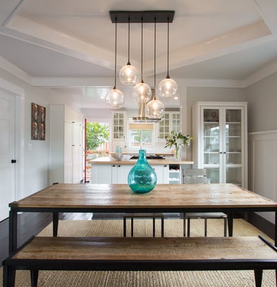 Open and spacious living and dining area. Original craftsman ceilings.