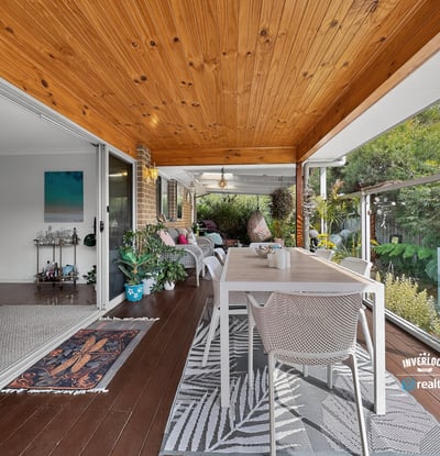 Experience effortless indoor-outdoor living with this spacious covered patio, perfect for gatherings and relaxation.