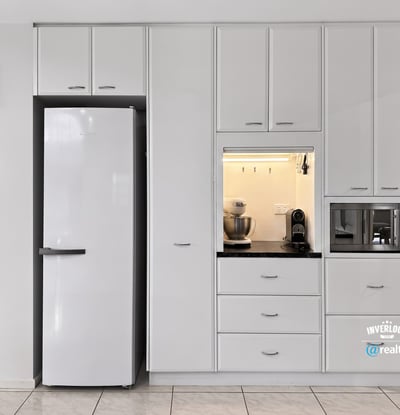 Modern kitchen featuring sleek cabinetry, ample storage, and integrated appliances for effortless cooking and entertaining.