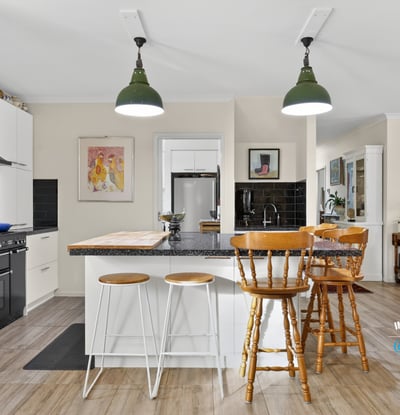 Modern kitchen with a spacious island, perfect for entertaining and everyday functionality, awaits your culinary creativity.