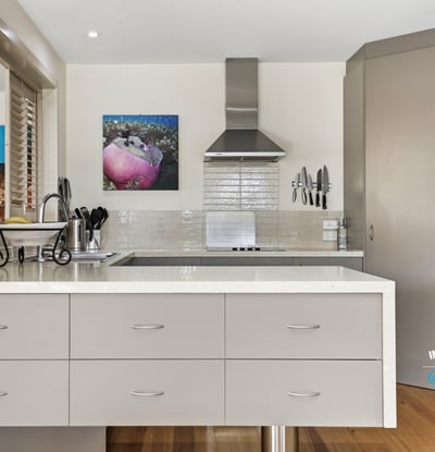 Modern kitchen featuring sleek cabinetry, high-end appliances, and an inviting layout perfect for cooking and entertaining.