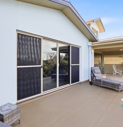 Spacious outdoor area featuring ample seating, ideal for relaxation and enjoying expansive views.