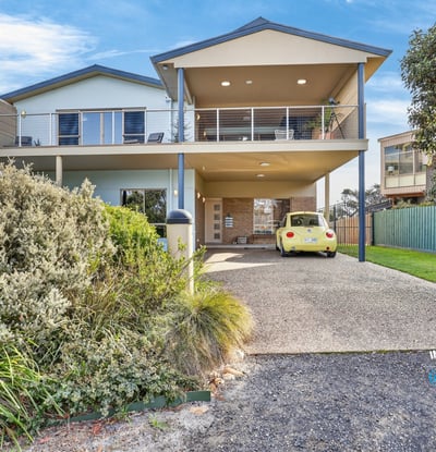 Spacious two-story home featuring expansive outdoor areas and modern amenities, perfect for entertaining or relaxing.
