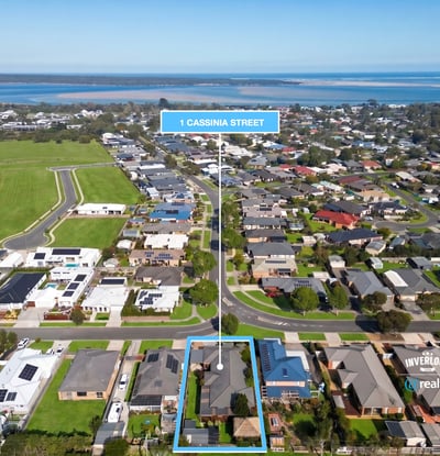 Expansive coastal lot in a developing neighborhood, offering stunning water views and convenient access to local amenities.