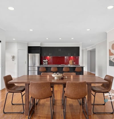 Modern kitchen and dining area with sleek finishes, perfect for entertaining and everyday living.