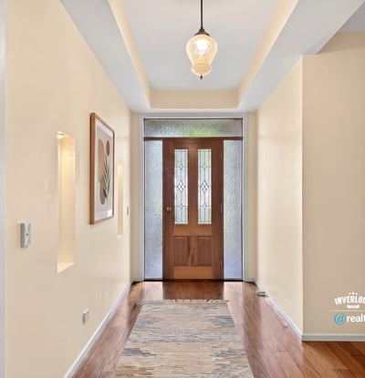 Inviting foyer with natural light, showcasing a welcoming entry that leads to the main living spaces.