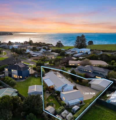 Expansive 1,225 sqm property with stunning ocean views and ample outdoor space for potential development.