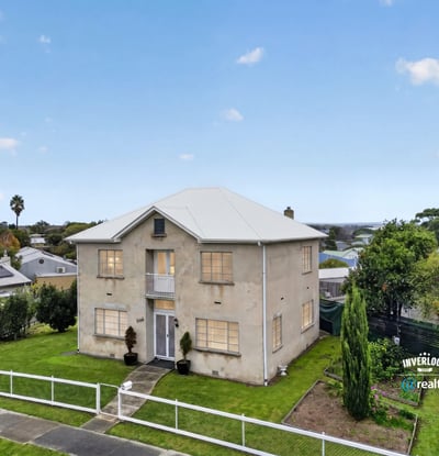 Spacious two-story home with ample outdoor space and panoramic views, perfect for family gatherings or relaxation.