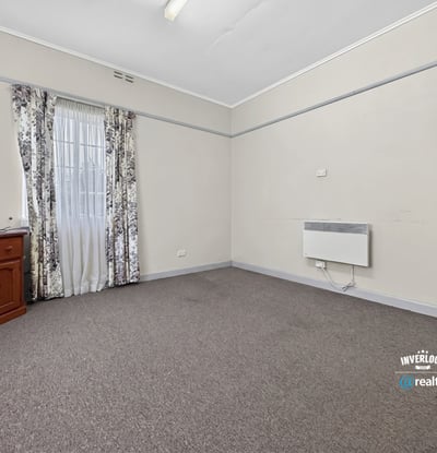 Bright, versatile room featuring ample natural light and neutral tones, perfect for various layout possibilities.