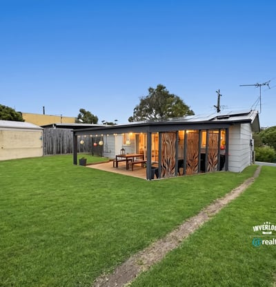 Discover this unique property featuring a spacious yard and modern outdoor living space, perfect for entertaining.