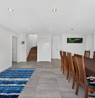 Spacious dining area features modern finishes, natural light, and a seamless flow to adjacent living spaces.