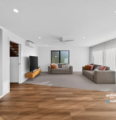 Spacious living area featuring modern finishes and ample natural light, perfect for relaxed entertaining.