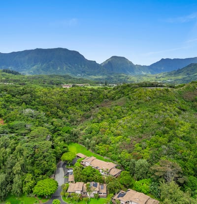 Nestled in lush landscaping, this property offers breathtaking mountain views and an idyllic retreat atmosphere.