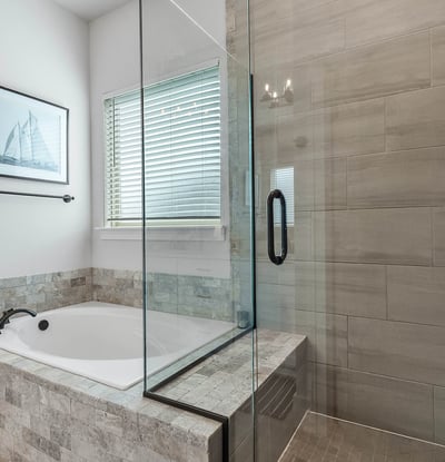 Soaking Tub and Glassed in Shower with Built-in Bench