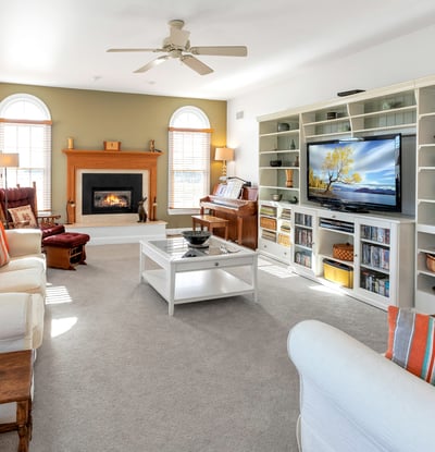 Relax and enjoy the warmth of the gas insert fireplace in the inviting Family Room. Beautiful arch-top windows.