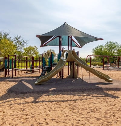 Local playground includes slides, climbing areas, and shaded structures, providing a safe, fun destination for kids and families.