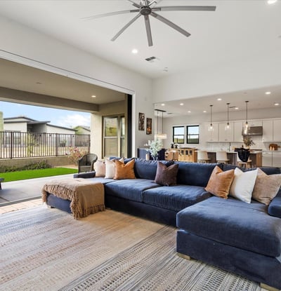 Open living area filled with natural light, high ceilings, and modern design elements. Perfect for Scottsdale buyers seeking spacious and stylish interiors.