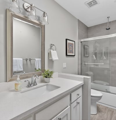 Stylish bathroom showcasing updated fixtures, clean lines, and a functional layout designed for everyday comfort.