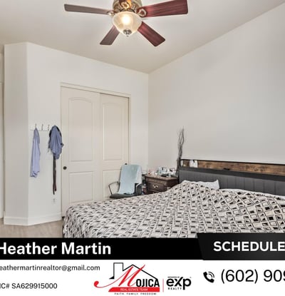 Large enough for a sitting area, this primary bedroom offers neutral finishes and modern updates. A peaceful retreat within this Glendale property featuring energy-efficient design and open living spaces.