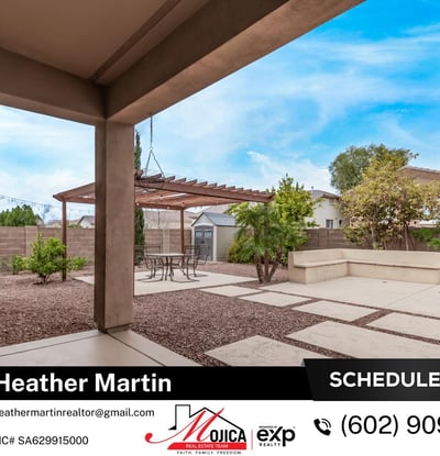 The covered patio overlooks the pergola and pool area, offering a seamless extension of indoor living. This Glendale home highlights energy efficiency, outdoor upgrades, and inviting entertaining spaces.