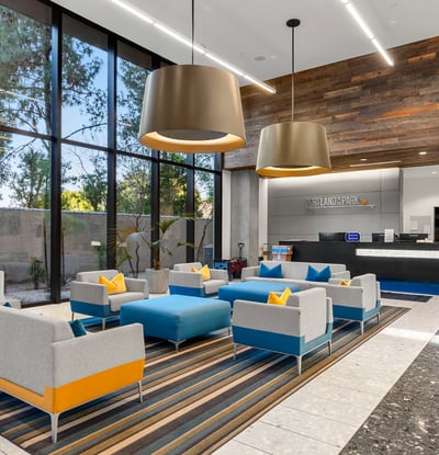Stylish reception space with sleek desk, modern lighting, and updated interior design, offering a polished welcome in Phoenix.