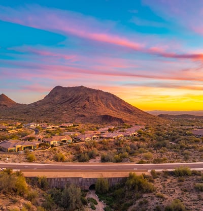 Scottsdale aerial showcasing mountain views, desert terrain, and surrounding community, highlighting the property s prime setting.