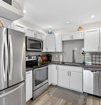 Sleek kitchen in Scottsdale with stainless steel appliances, contemporary cabinetry, and durable counters for a clean, updated look.