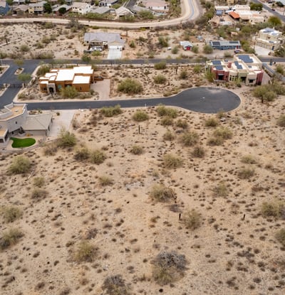 Peaceful hillside neighborhood surrounded by mountain landscapes and upscale custom homes. This elevated Phoenix homesite offers stunning views and a tranquil desert lifestyle.