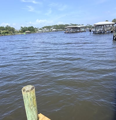 Enjoy stunning water views from this prime waterfront property, with direct access to boating and fishing.